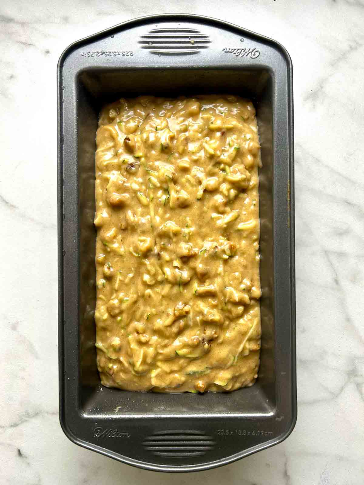 batter spread into loaf pan.