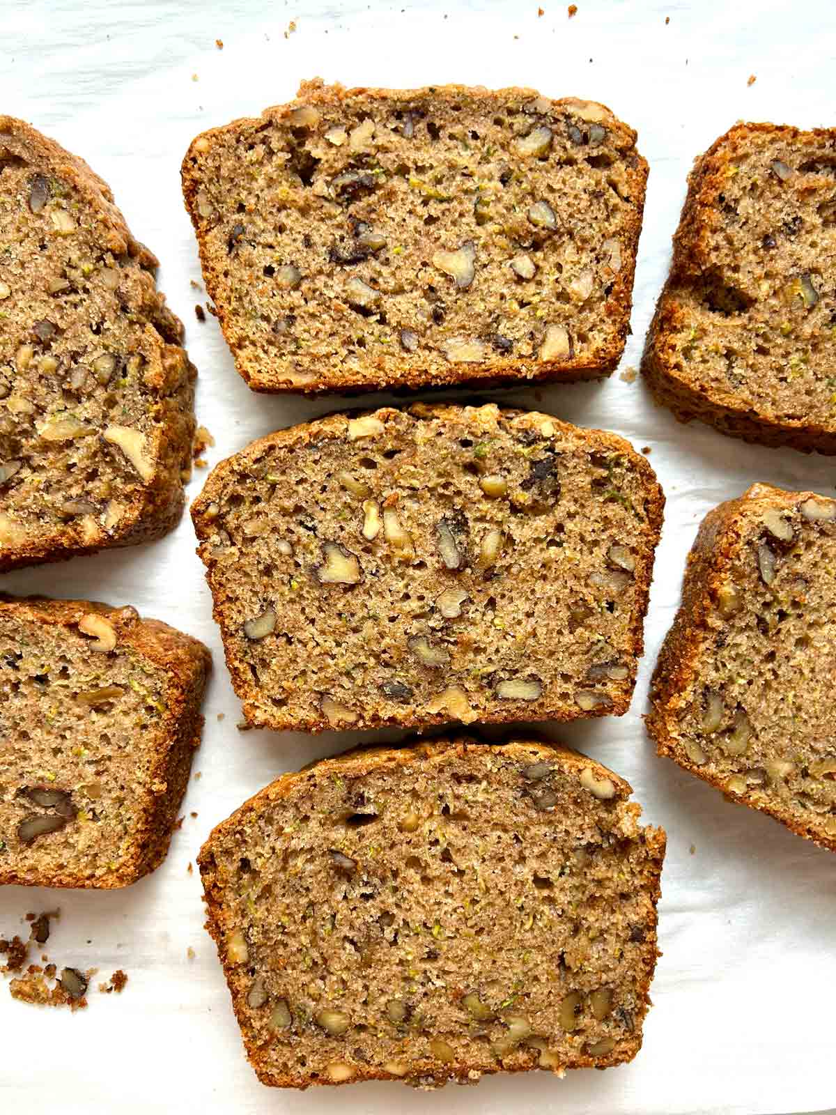 overhead shot of sourdough zucchini bread slices showing the cross section.