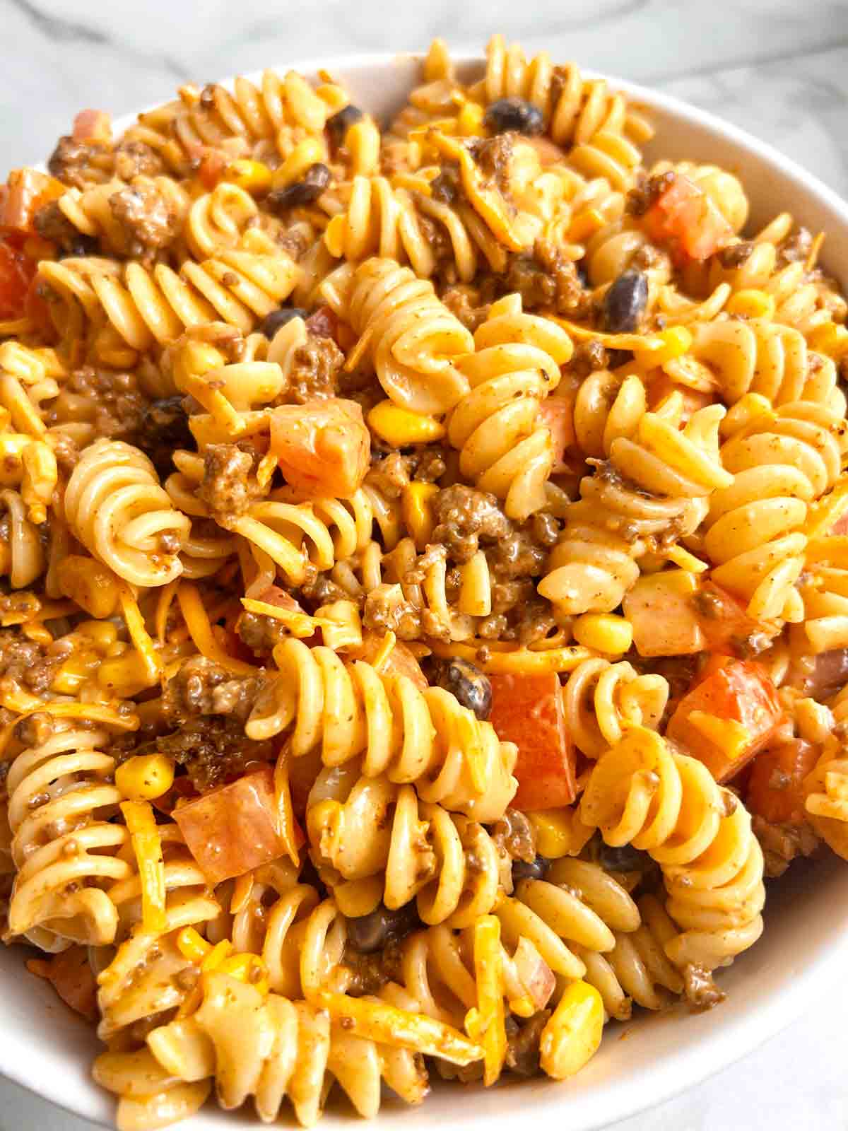 close up of taco pasta salad in bowl.