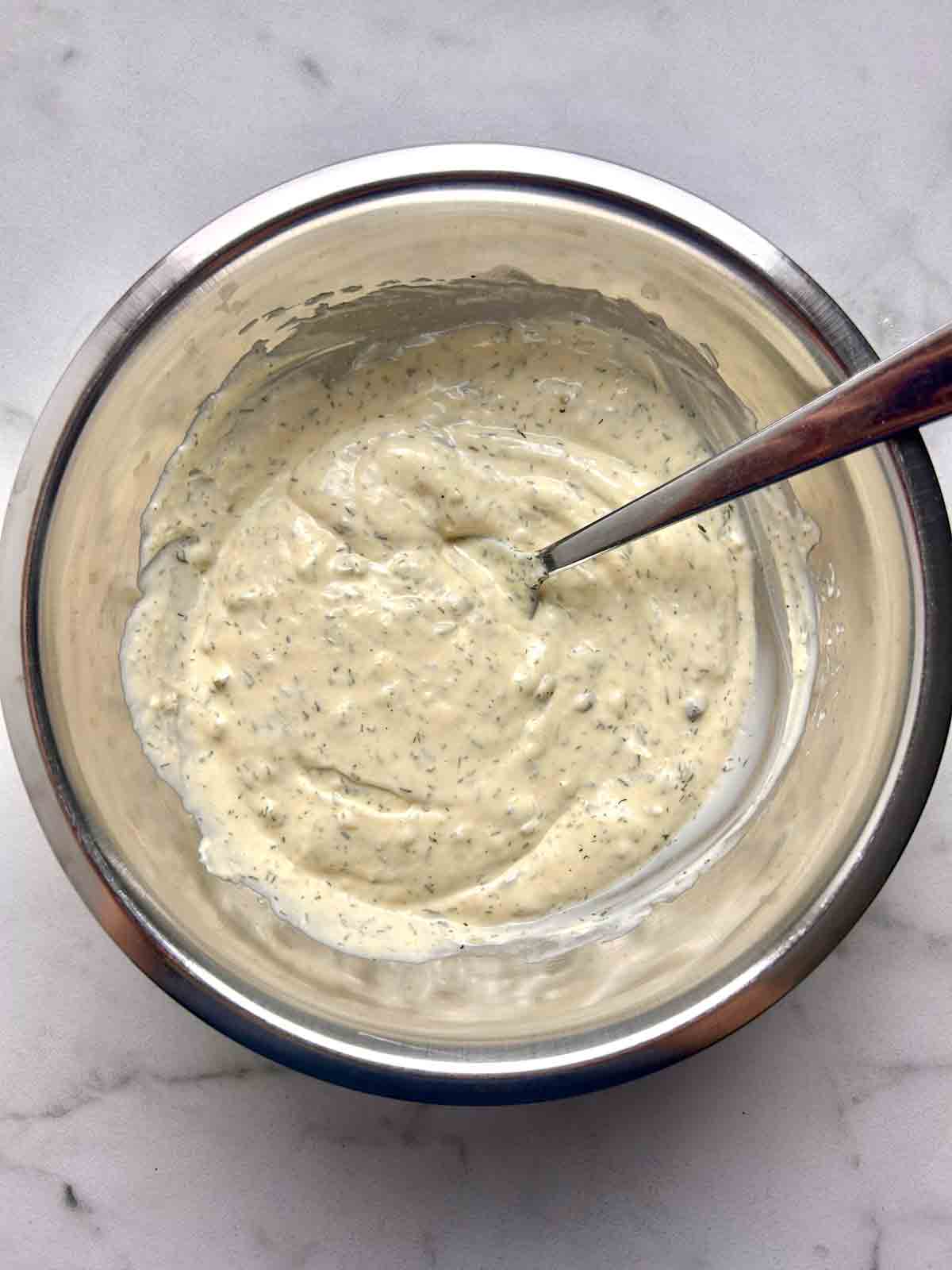 dressing mixed in bowl.