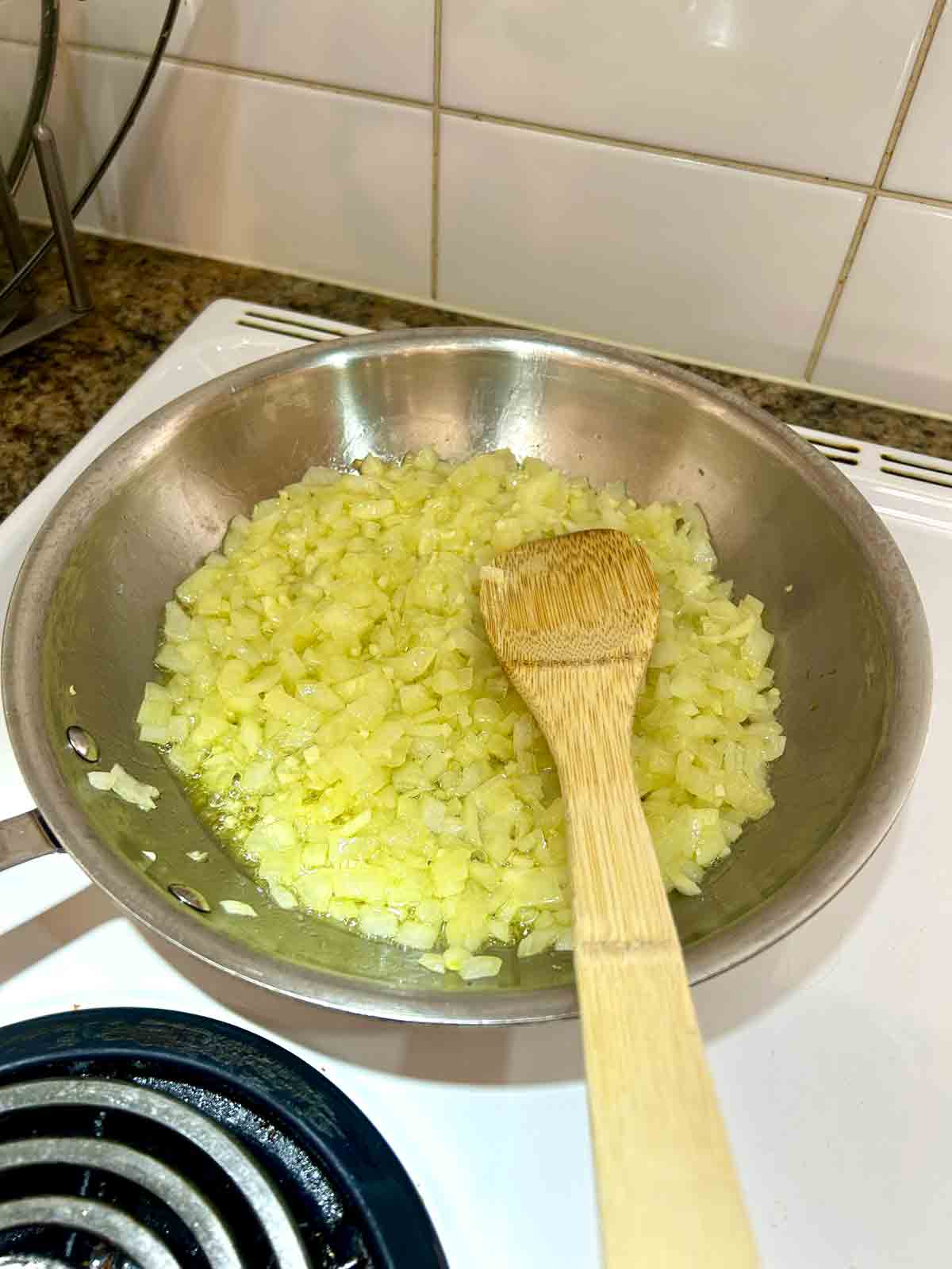 onions and garlic cooked in skillet.