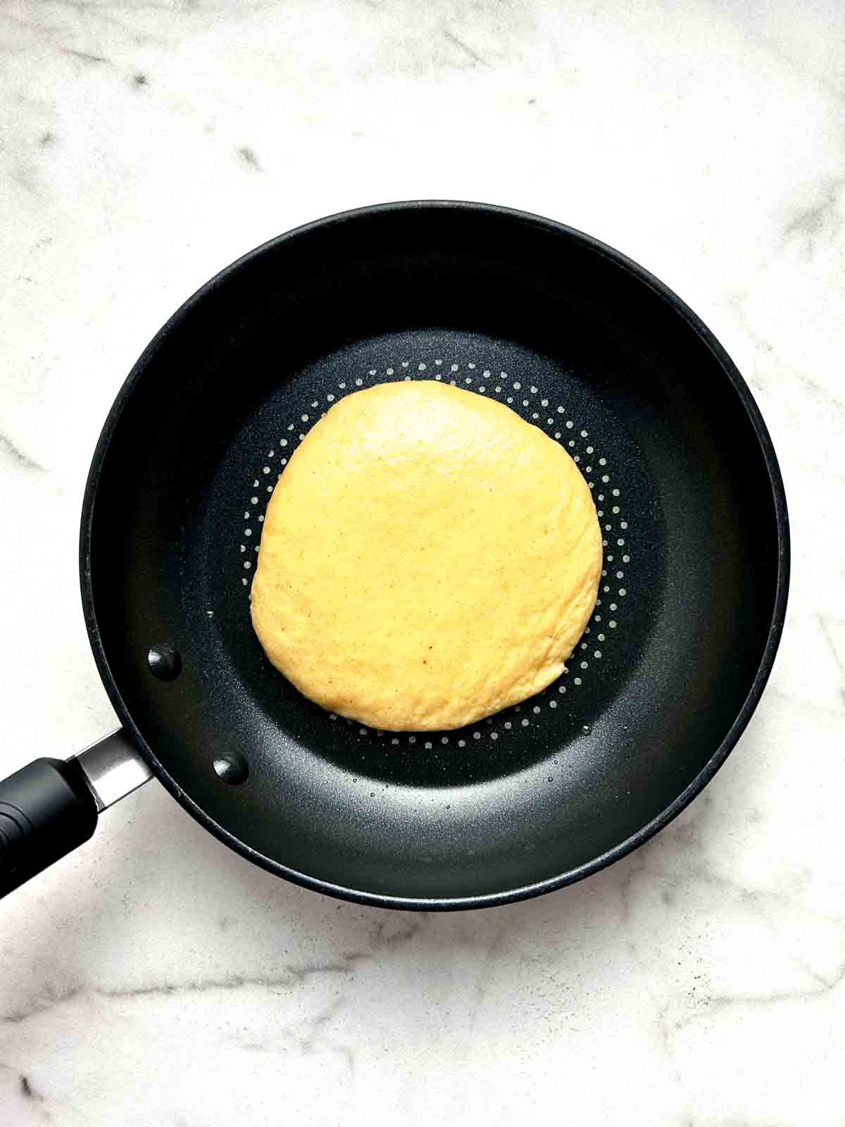 batter poured into nonstick pan.