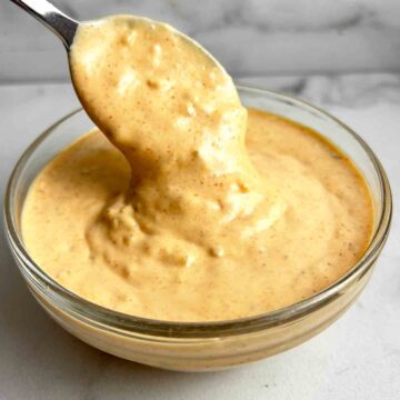 spoon lifting Big Mac Sauce from bowl.