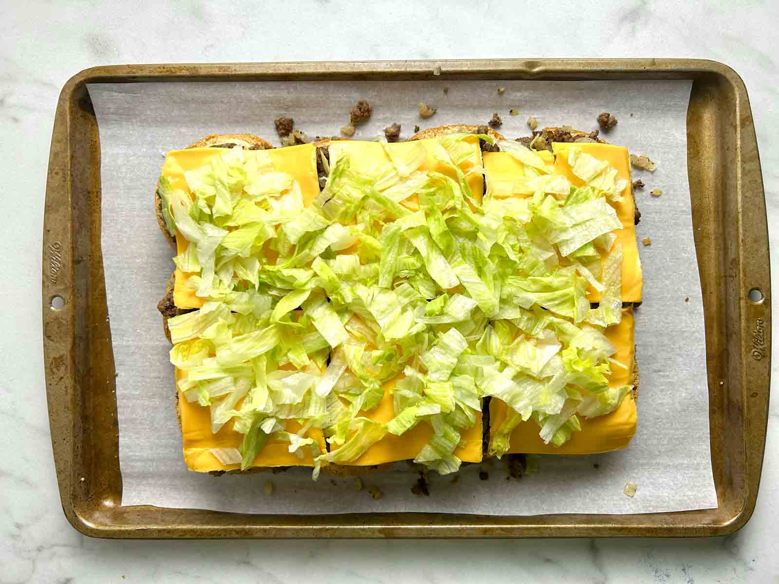lettuce added on top of cheese.