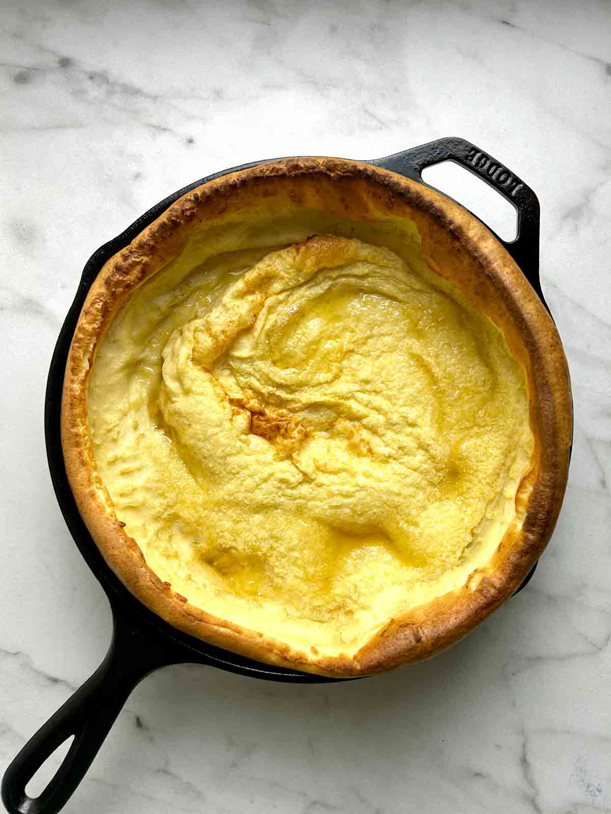 Dutch baby after baking; puffed and golden.