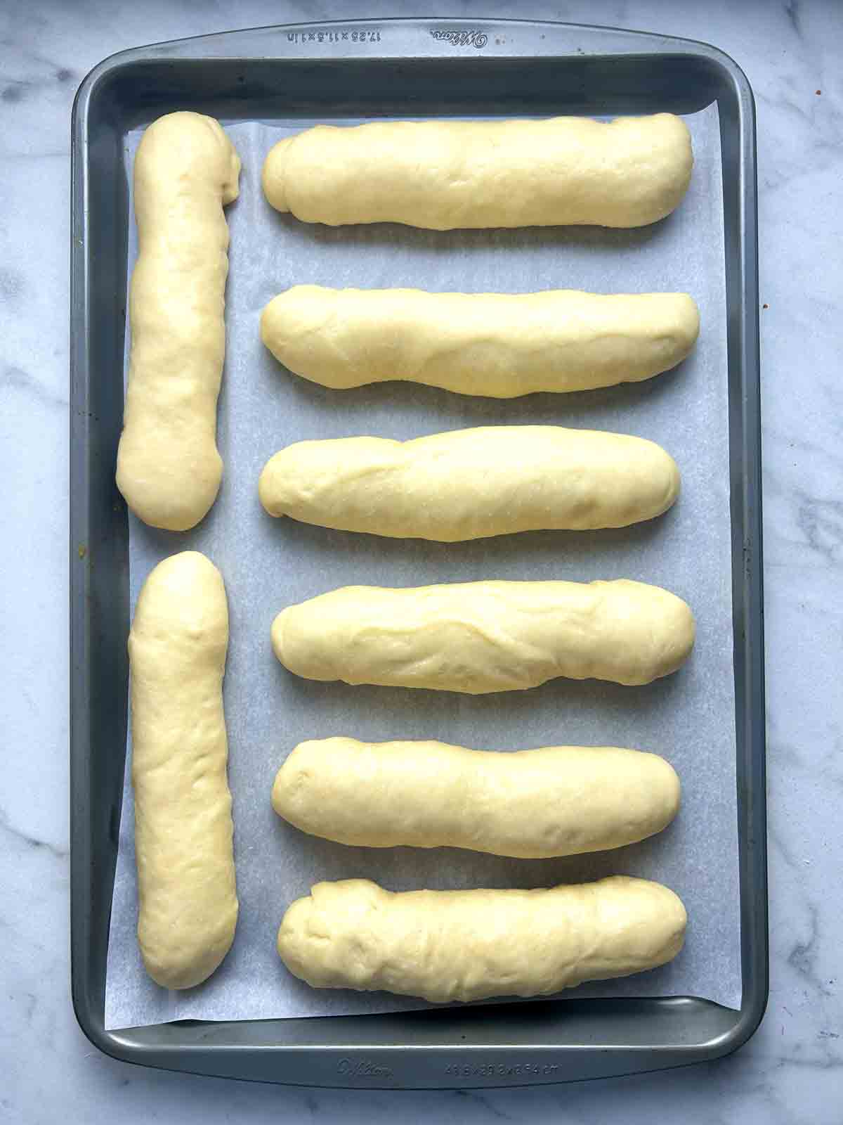 buns after rising; noticeably puffed.