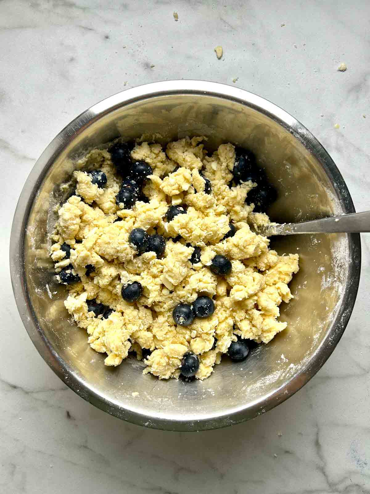 dough coming together in bowl.
