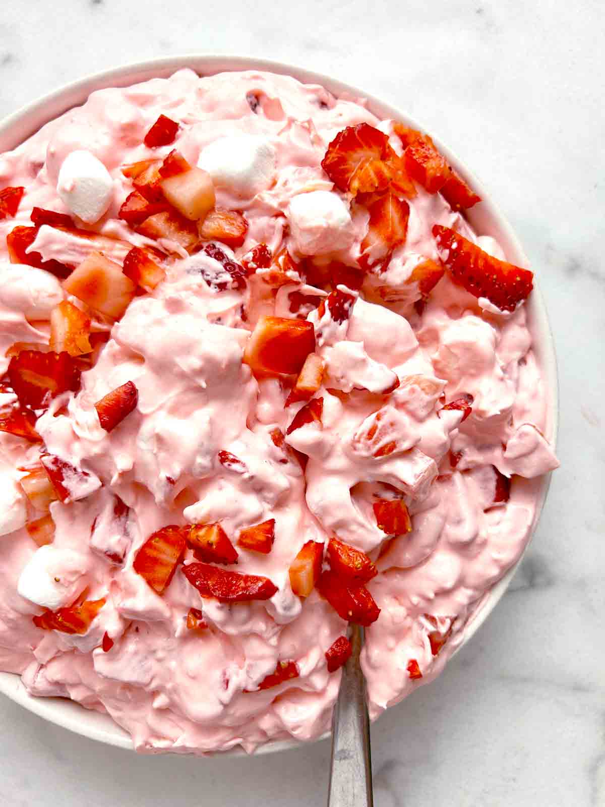 close up of strawberry fluff in bowl.
