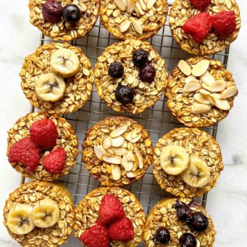 close up of baked oatmeal cups on wire rack.