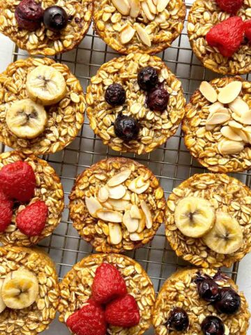 close up of baked oatmeal cups on wire rack.