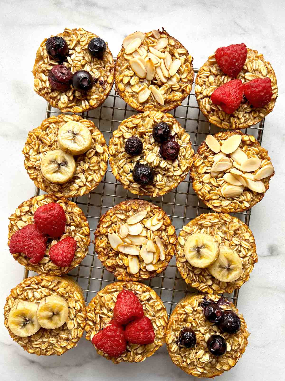 close up of baked oatmeal cups on wire rack.