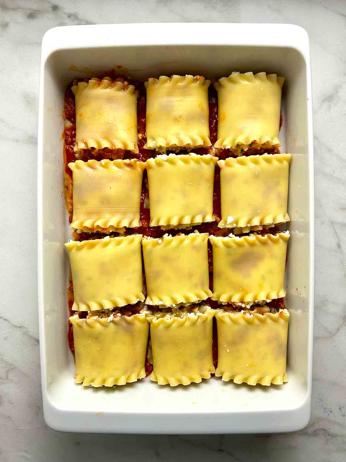 rolls placed on baking dish.