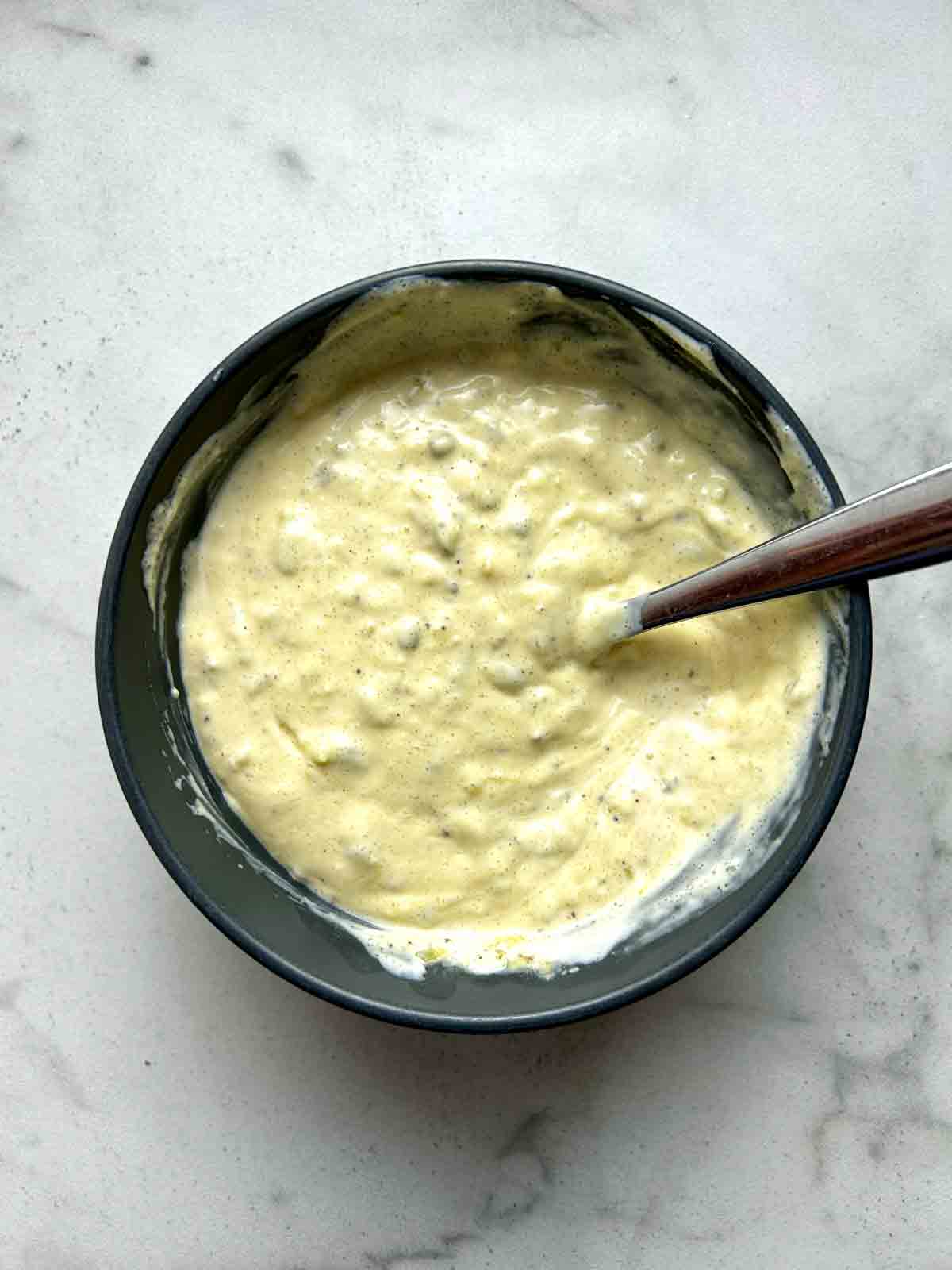 dressing ingredients combined in bowl.
