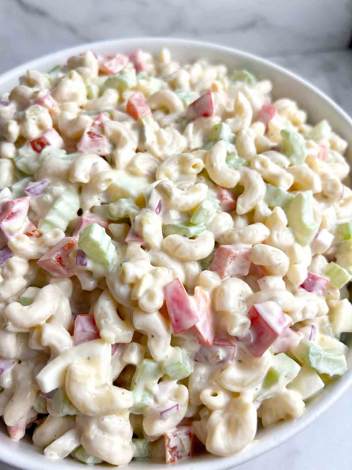 close up of macaroni salad in bowl.