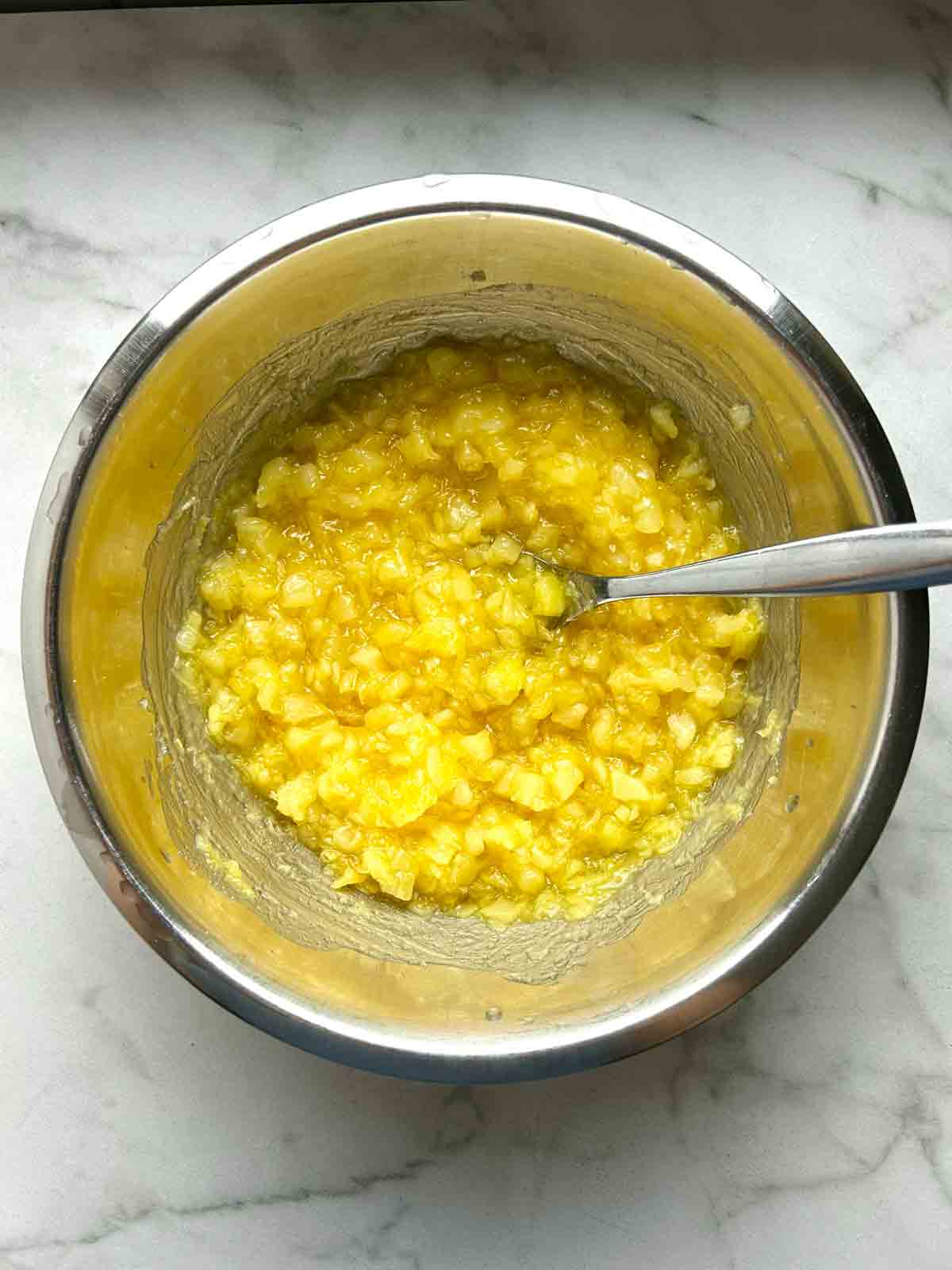 crushed pineapples mixed with vanilla pudding mix.