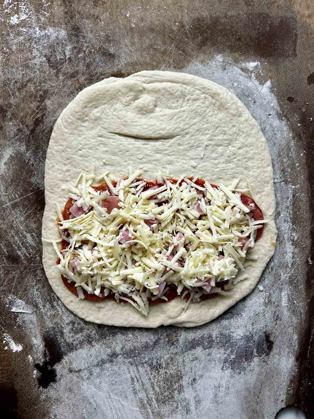 cheese sprinkled on top of meat.