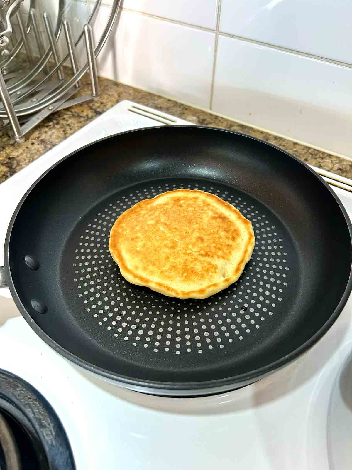 pancake in skillet after flipping.