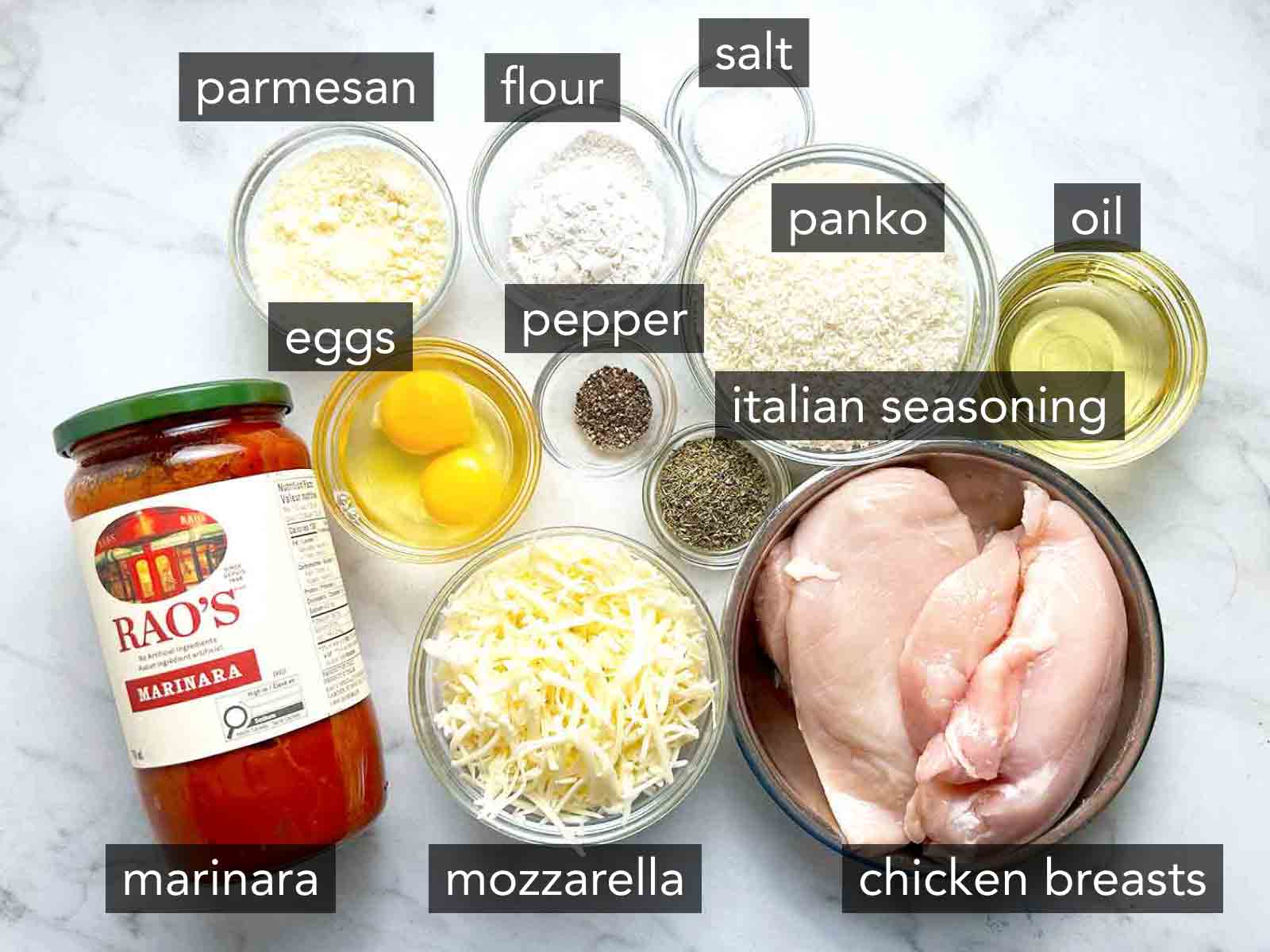 overhead shot of labelled ingredients for chicken parmesan.