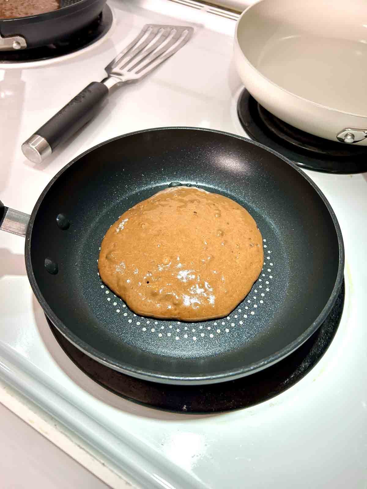 batter scooped into small pan.